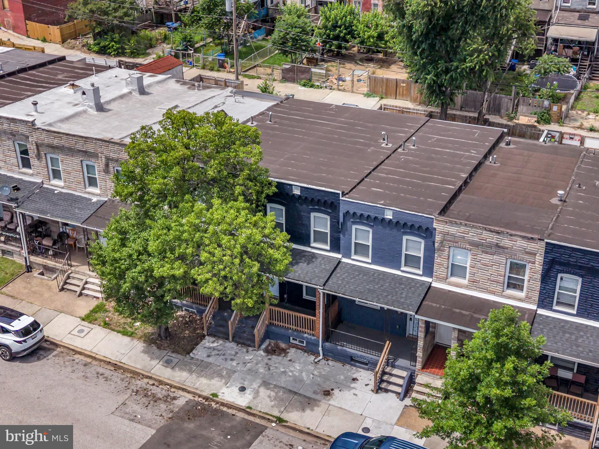 1622 Hazel Street Baltimore, MD 21226 - Photo 27 of 40 Charming row homes with lush greenery.