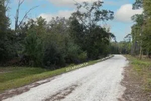 a view of a road with a yard