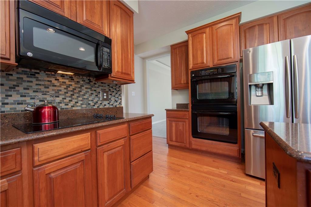 3839 Anderson Road Gibsonia, PA 15044 - Photo 7 of 24 Handsome wood cabinetry...