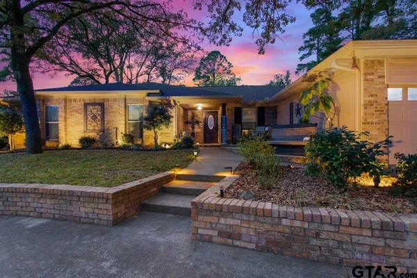 a view of a house with a patio