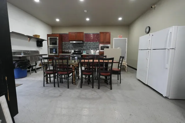 a view of a dining room with furniture
