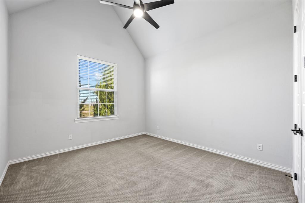 5707 Florance Road Northlake, TX 76226 - Photo 19 of 31 an empty room with windows