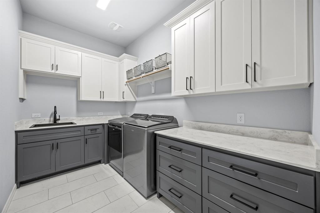 5707 Florance Road Northlake, TX 76226 - Photo 21 of 31 a kitchen with cabinets appliances and a sink