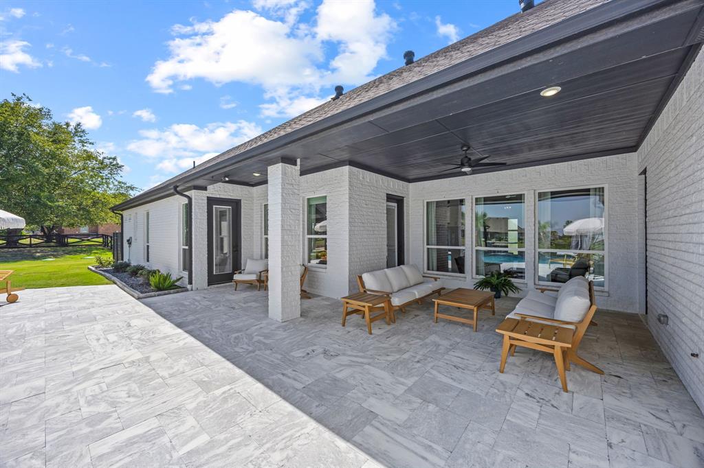 5707 Florance Road Northlake, TX 76226 - Photo 22 of 31 a building outdoor space with patio furniture and garden