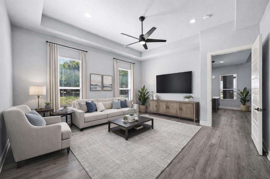 5707 Florance Road Northlake, TX 76226 - Photo 25 of 31 a living room with furniture and a flat screen tv