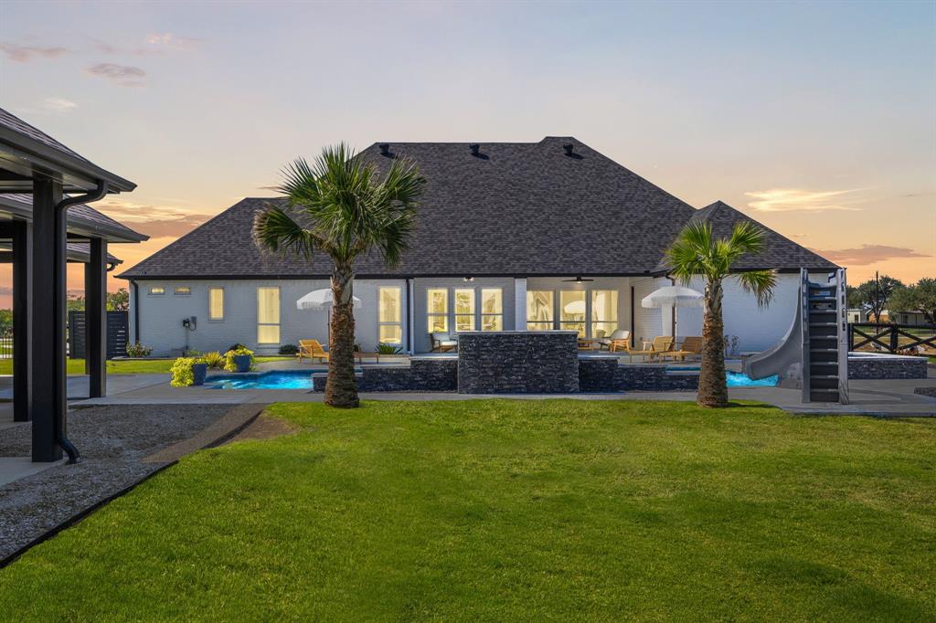 5707 Florance Road Northlake, TX 76226 - Photo 27 of 31 a view of a house with a yard and sitting area