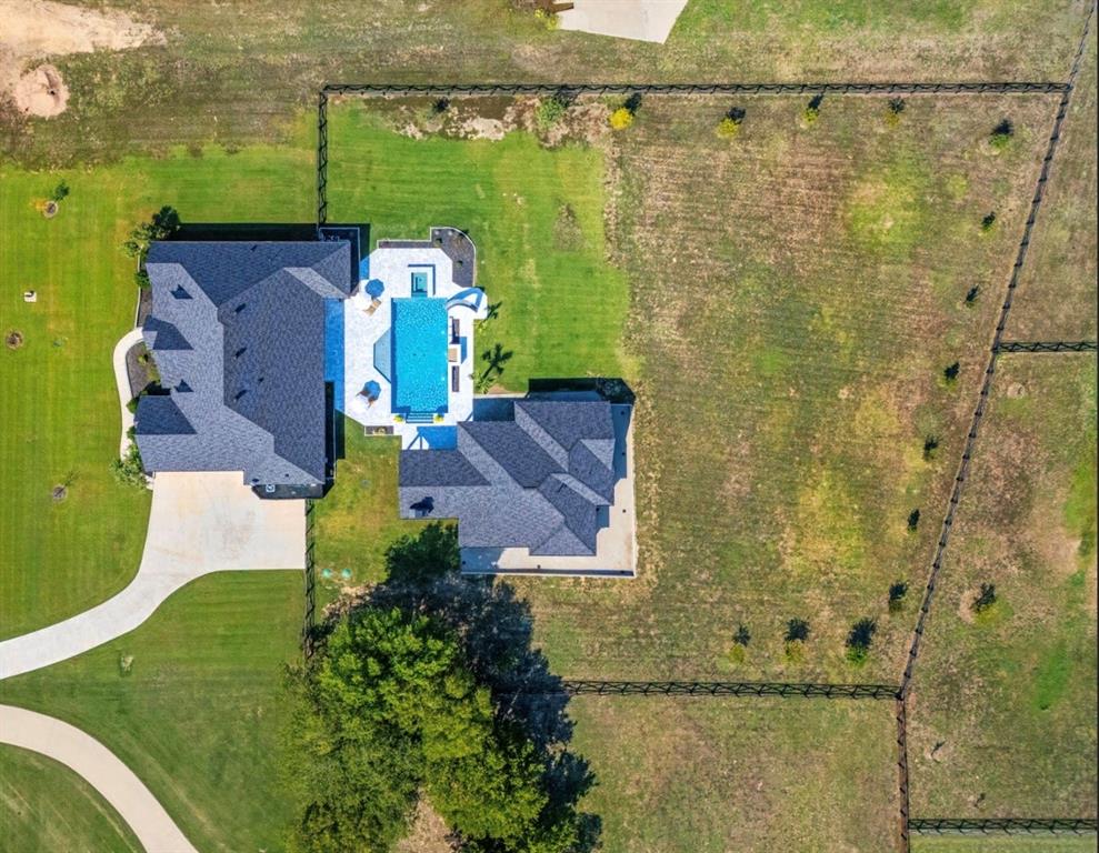 5707 Florance Road Northlake, TX 76226 - Photo 3 of 31 an aerial view of a house with a yard