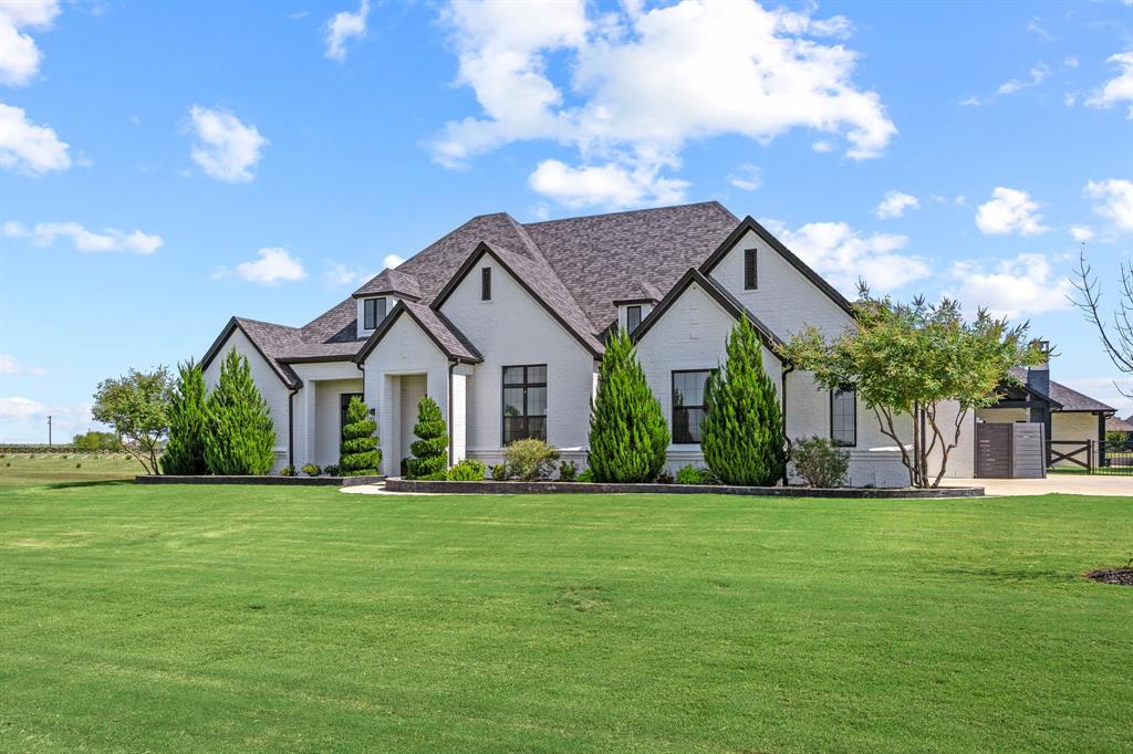 5707 Florance Road Northlake, TX 76226 - Photo 31 of 31 a front view of house with yard and green space