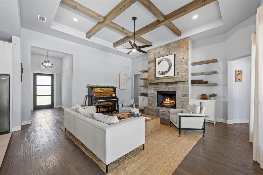 5707 Florance Road Northlake, TX 76226 - Photo 5 of 31 a living room with furniture and a fireplace