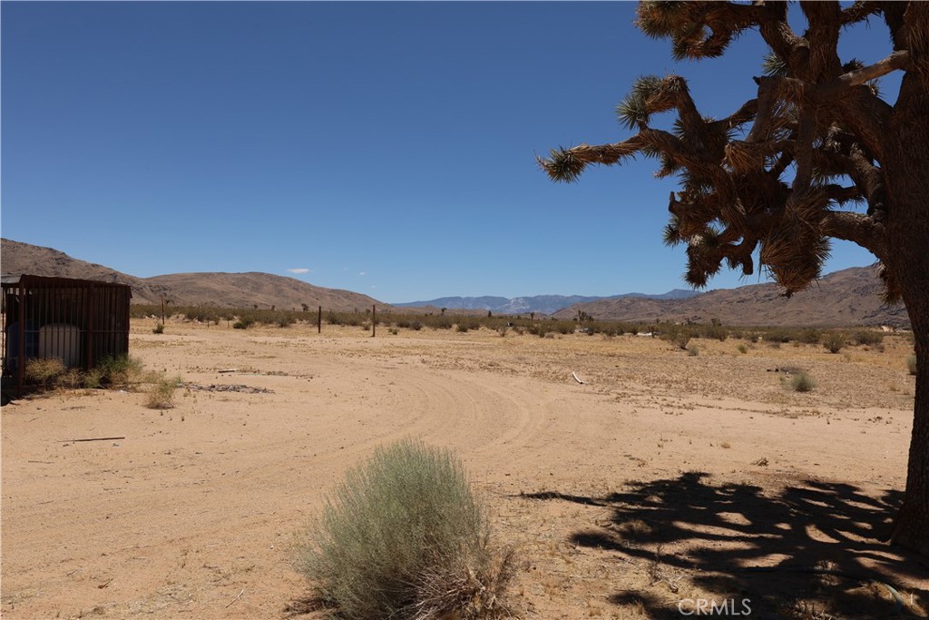 5 Oldenburg Road Apple Valley, CA 92307 - Photo 2 of 7 a view of lake with mountain