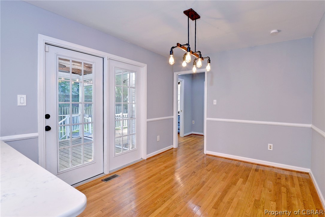 137 Wilderness Road Hampton, VA 23669 - Photo 41 of 45 Doorway with light hardwood / wood-style flooring