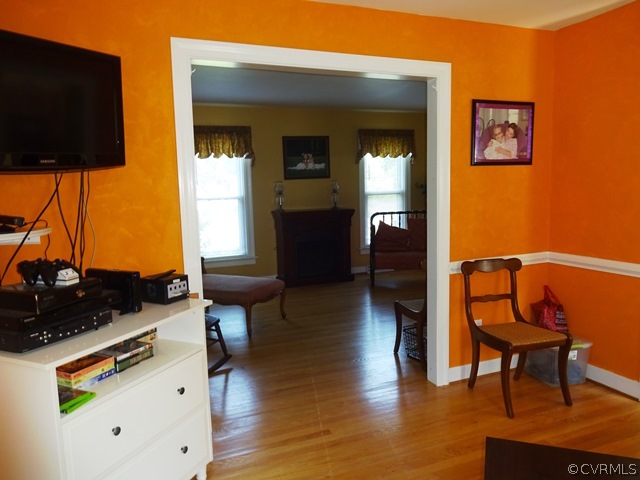 10705 Lunswood Road Chester, VA 23831 - Photo 7 of 22 Dining Room with Wood Floors and Chair Rail - bein