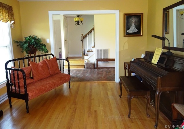 10705 Lunswood Road Chester, VA 23831 - Photo 9 of 22 Formal Living Room with Wood Floor