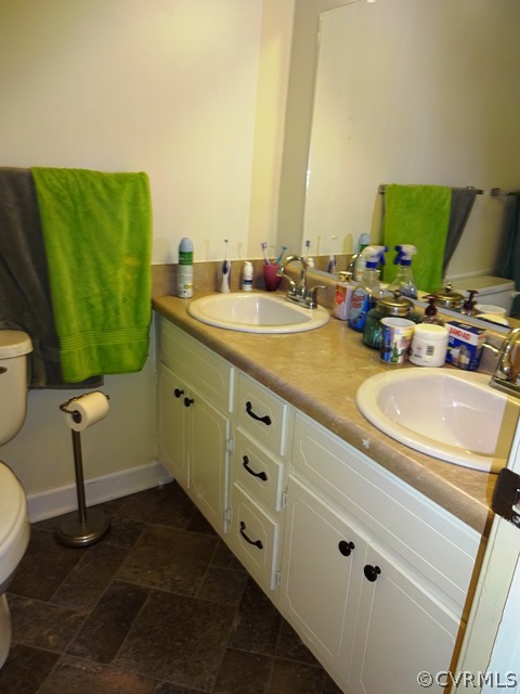 10705 Lunswood Road Chester, VA 23831 - Photo 10 of 22 Upstairs Hall Bath with New Vinyl Floor, Sinks and