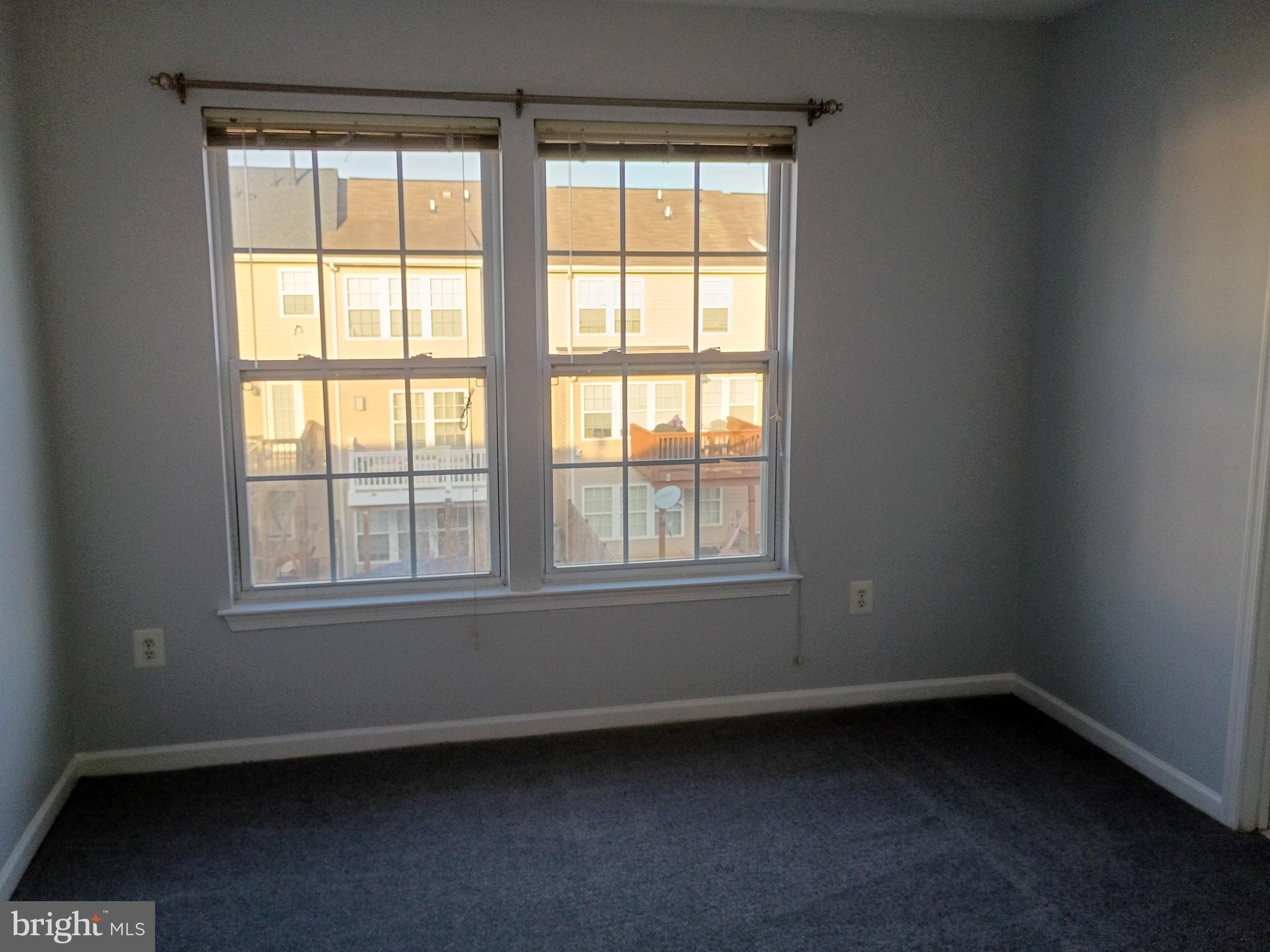 9707 Selfridge Road Baltimore, MD 21220 - Photo 18 of 22 an empty room with a window