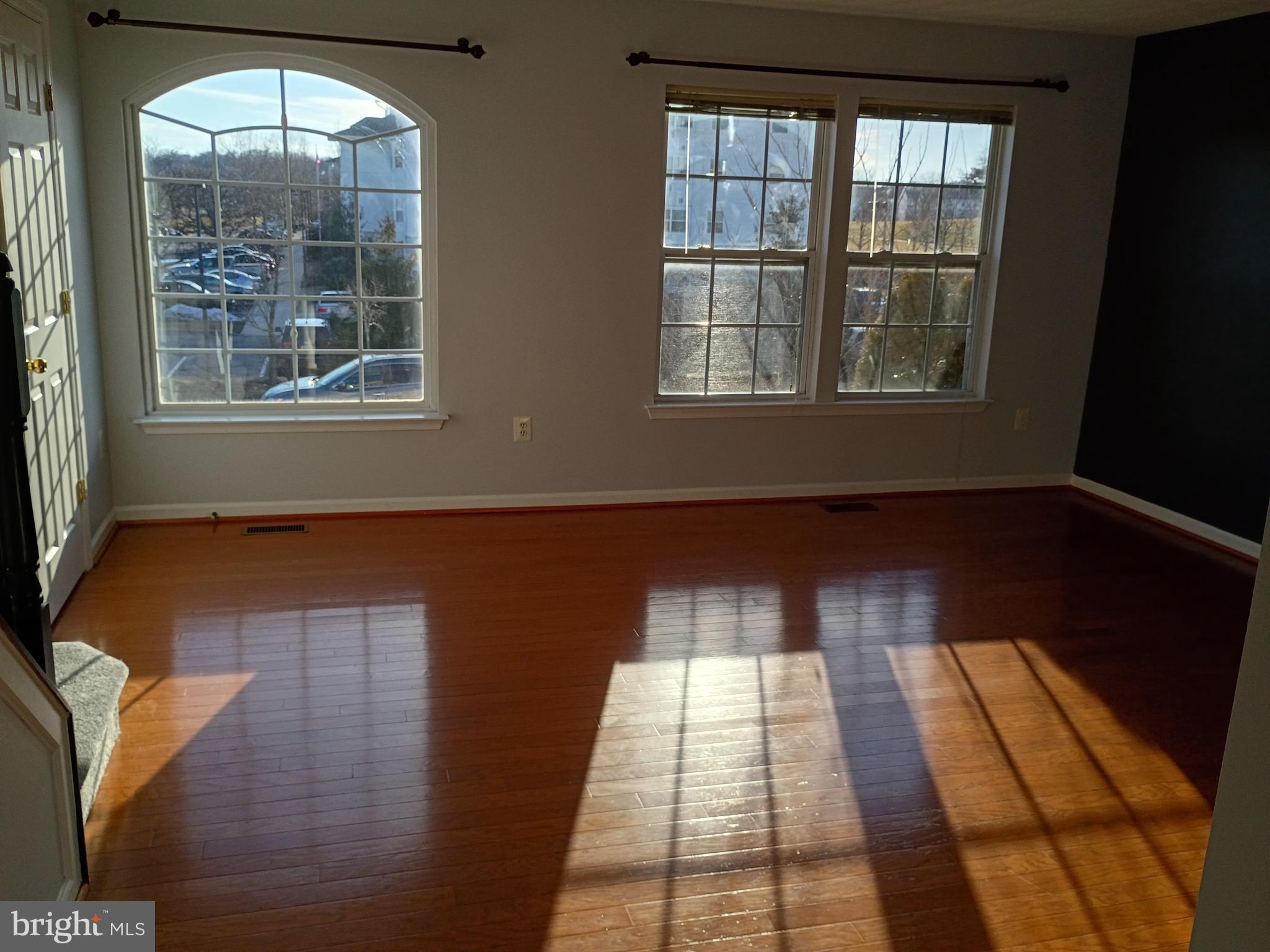 9707 Selfridge Road Baltimore, MD 21220 - Photo 8 of 22 a view of empty room with windows