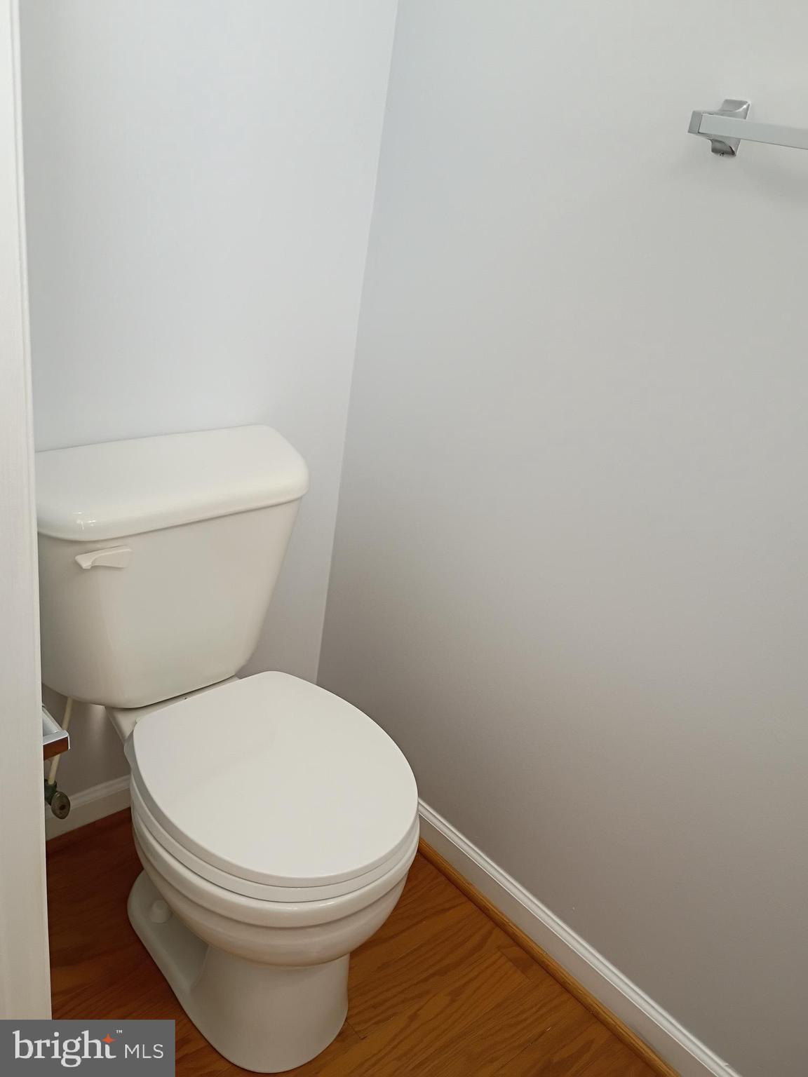 9707 Selfridge Road Baltimore, MD 21220 - Photo 9 of 22 a white toilet sitting next to a shower