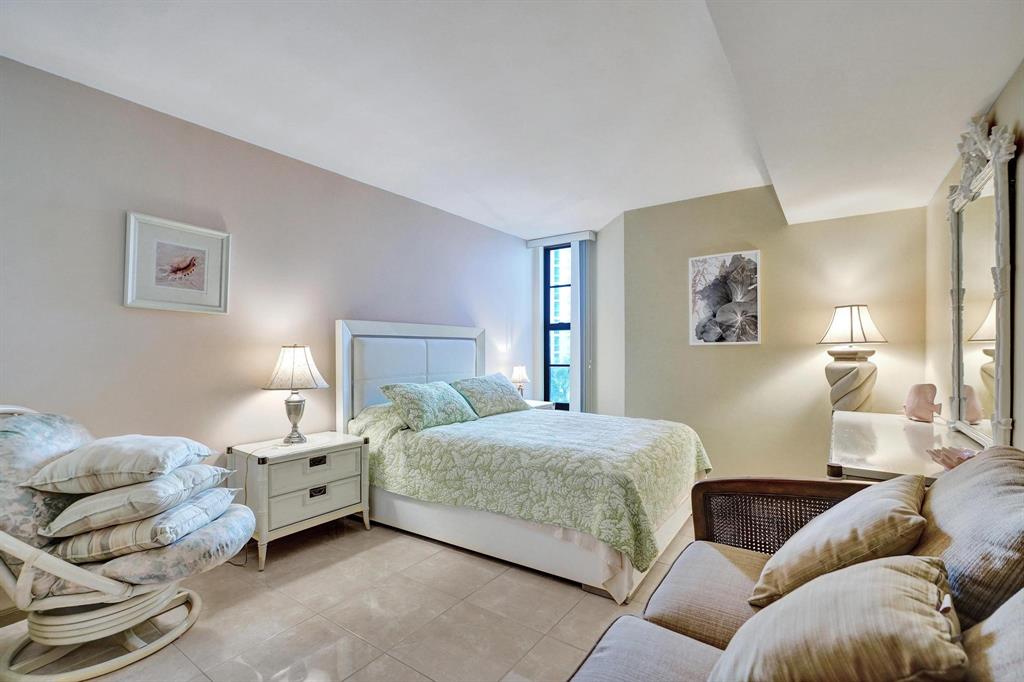 1000 South Ocean Boulevard, Unit 6M Pompano Beach, FL 33062 - Photo 16 of 31 a bedroom with a bed and a couch