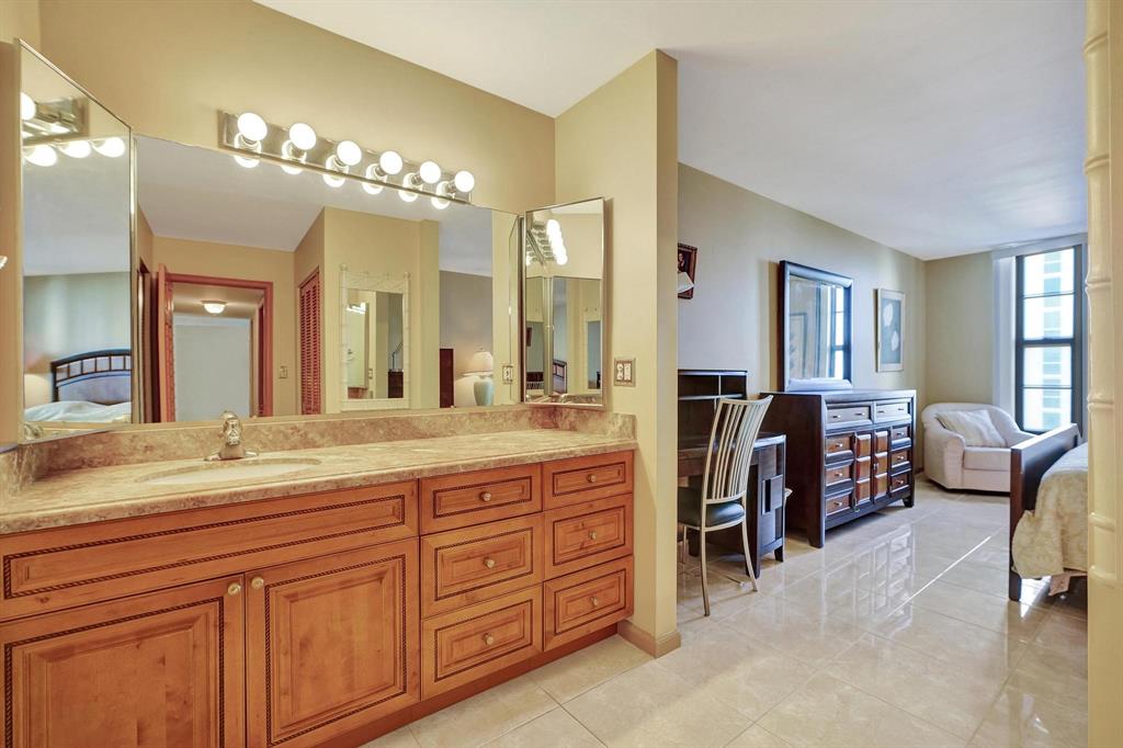 1000 South Ocean Boulevard, Unit 6M Pompano Beach, FL 33062 - Photo 25 of 31 a spacious en suite bathroom with double sink and a large mirror