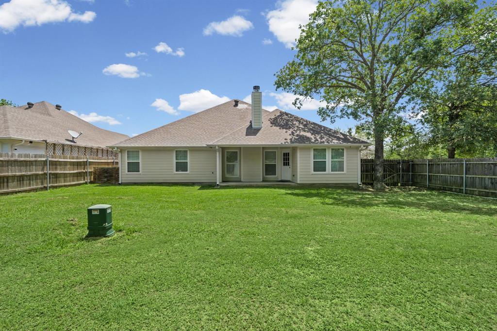 229 Firefly Drive Springtown, TX 76082 - Photo 26 of 33 Back house