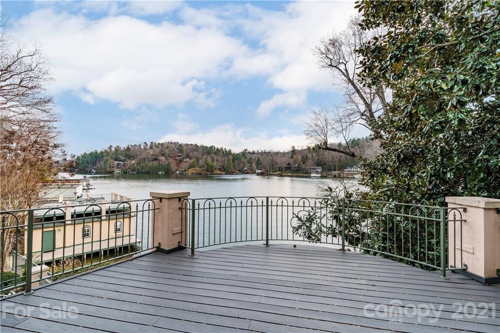 454 Cut Away Road Lake Lure, NC 28746 - Photo 23 of 48 a view of a balcony with wooden floor and fence
