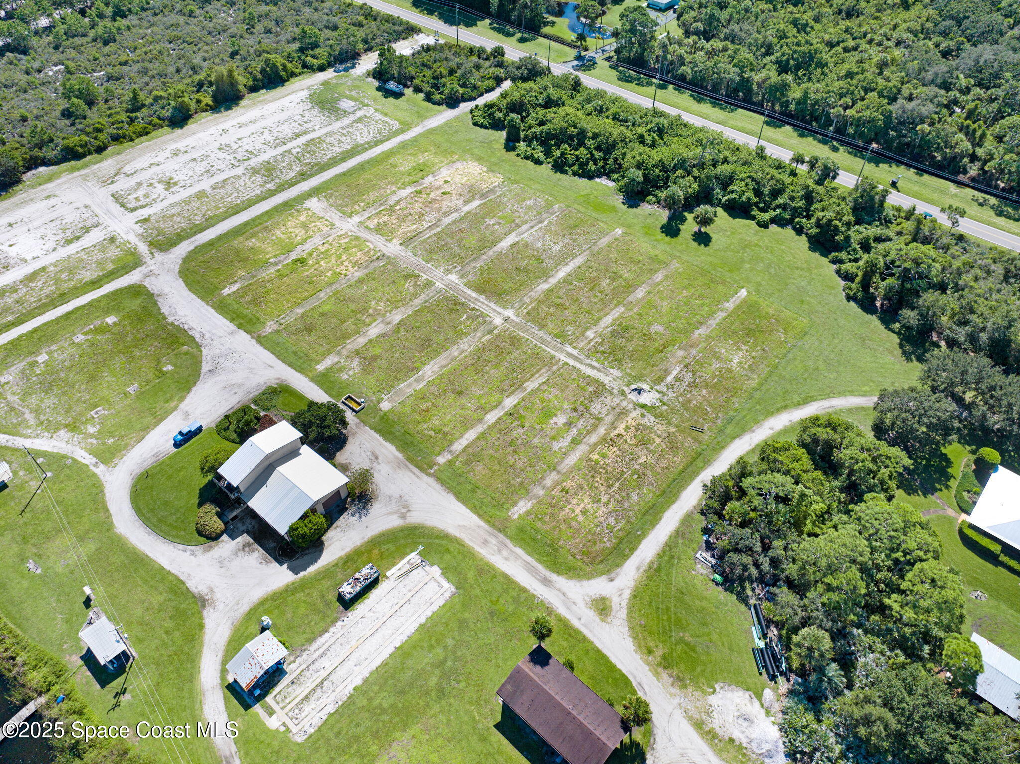 A Berry Road Grant Valkaria, FL 32949 - Photo 20 of 46 an aerial view of a pool yard swimming pool and outdoor seating