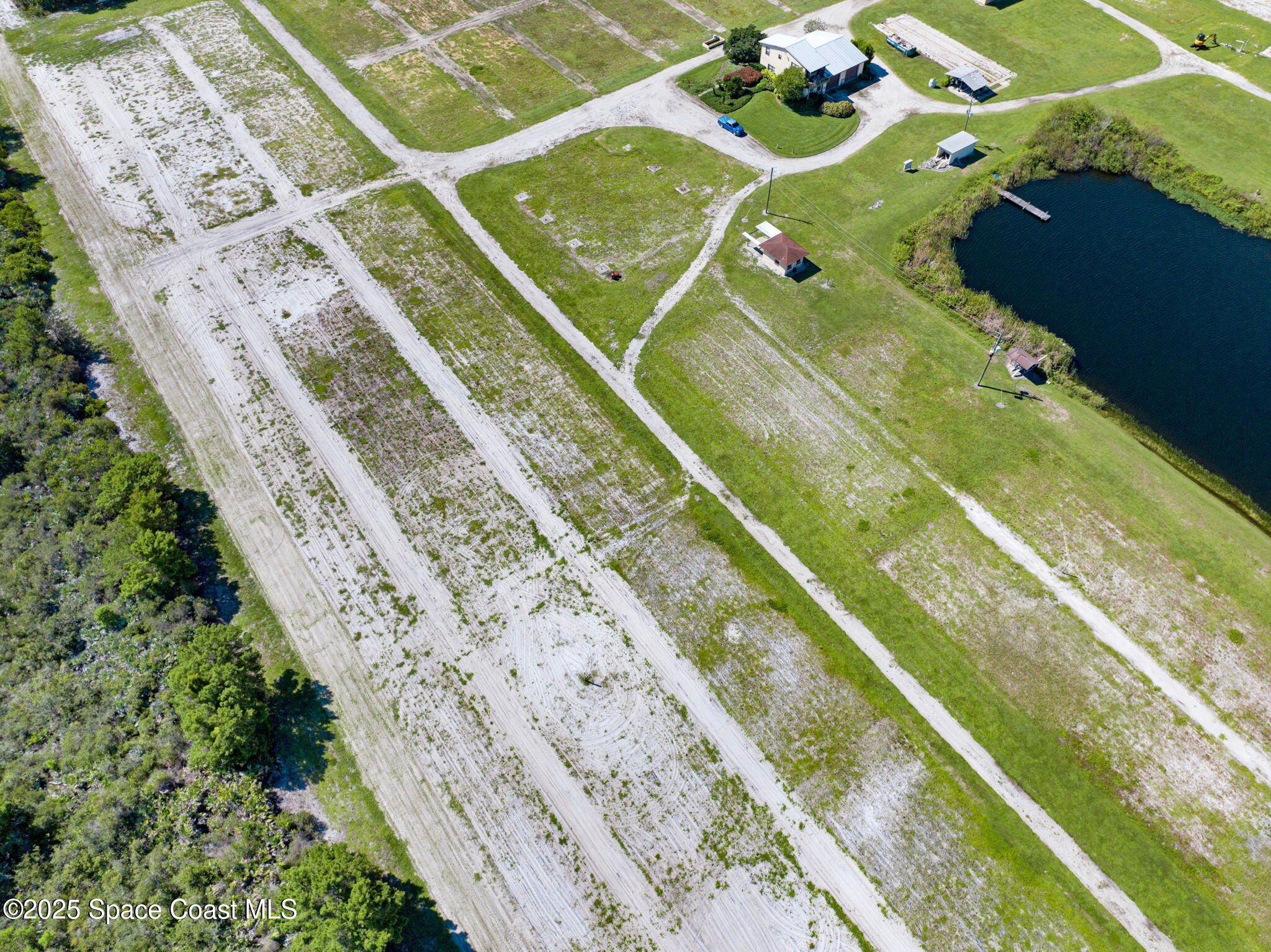 A Berry Road Grant Valkaria, FL 32949 - Photo 33 of 46 a view of swimming pool with a balcony