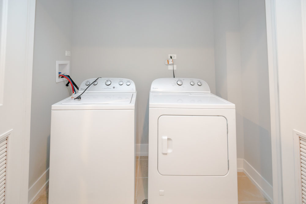 1202 Waukegan Road, Unit 410 Glenview, IL 60025 - Photo 10 of 15 a utility room with dryer and washer