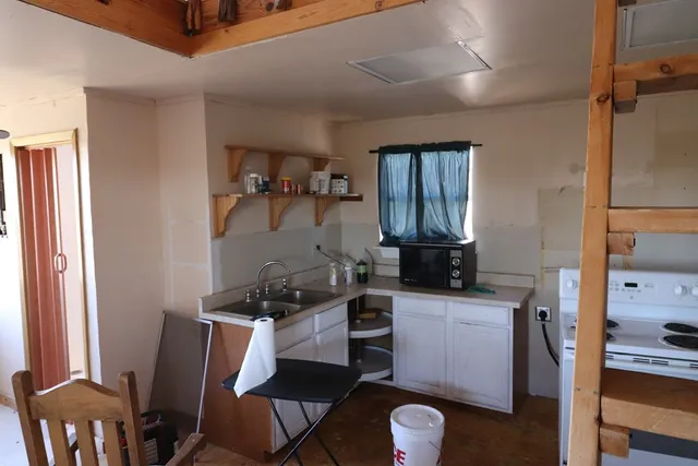 a view of a city and mountains in the background