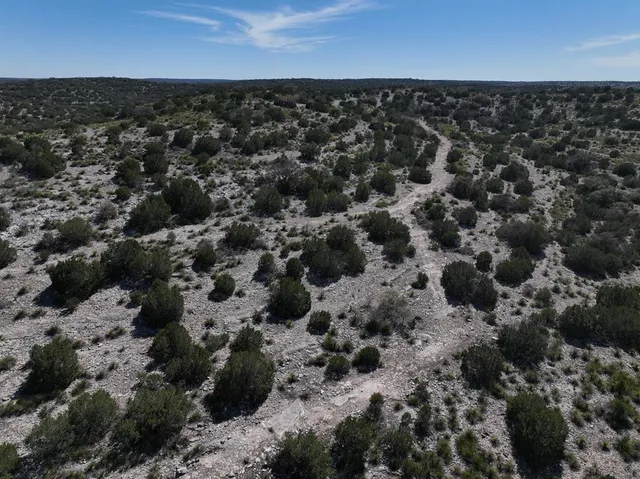 an aerial view of a city with lots of residential buildings