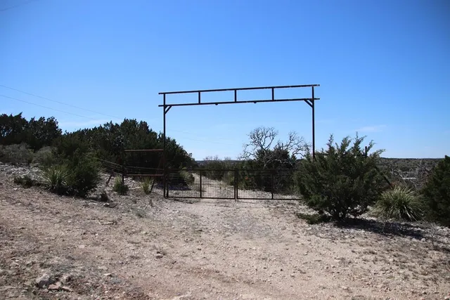 a view of a backyard of the house