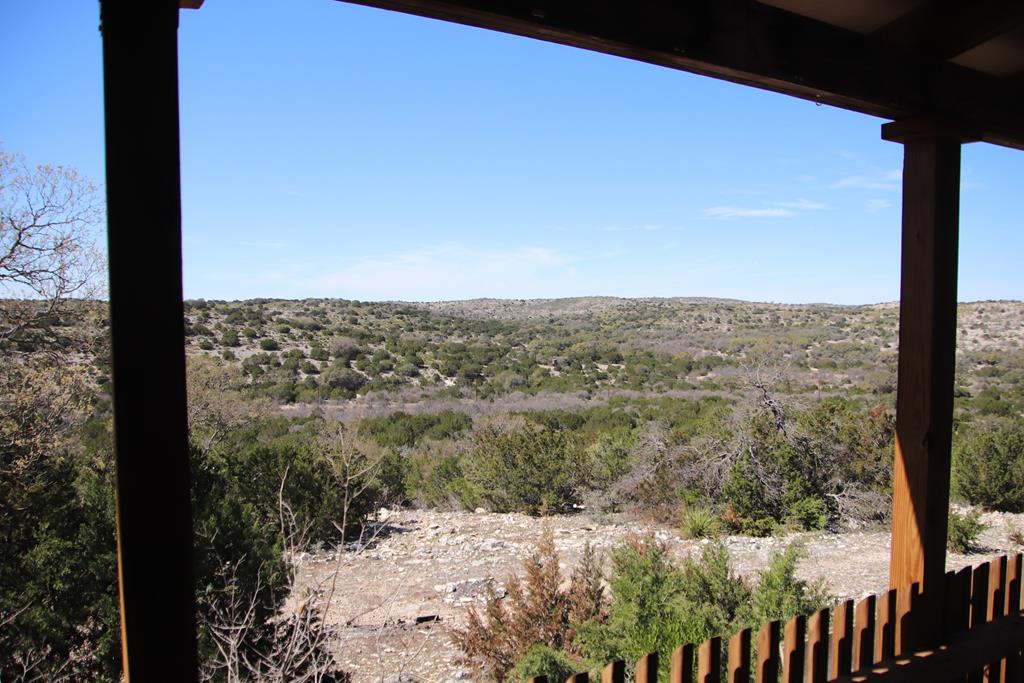 45200 Cr 450 Rocksprings Tx 78880 Rocksprings, TX 78880 - Photo 38 of 55 a view of a lake from a balcony
