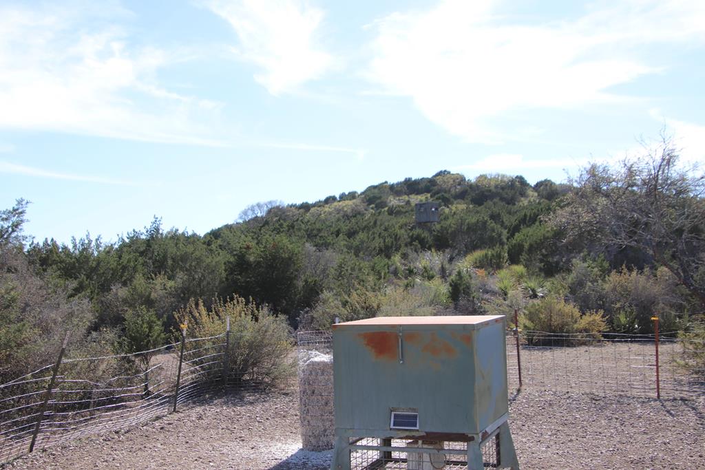 45200 Cr 450 Rocksprings Tx 78880 Rocksprings, TX 78880 - Photo 55 of 55 an aerial view of a house with mountain view