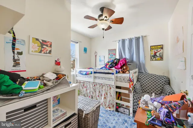 a bed room with a bed and furniture