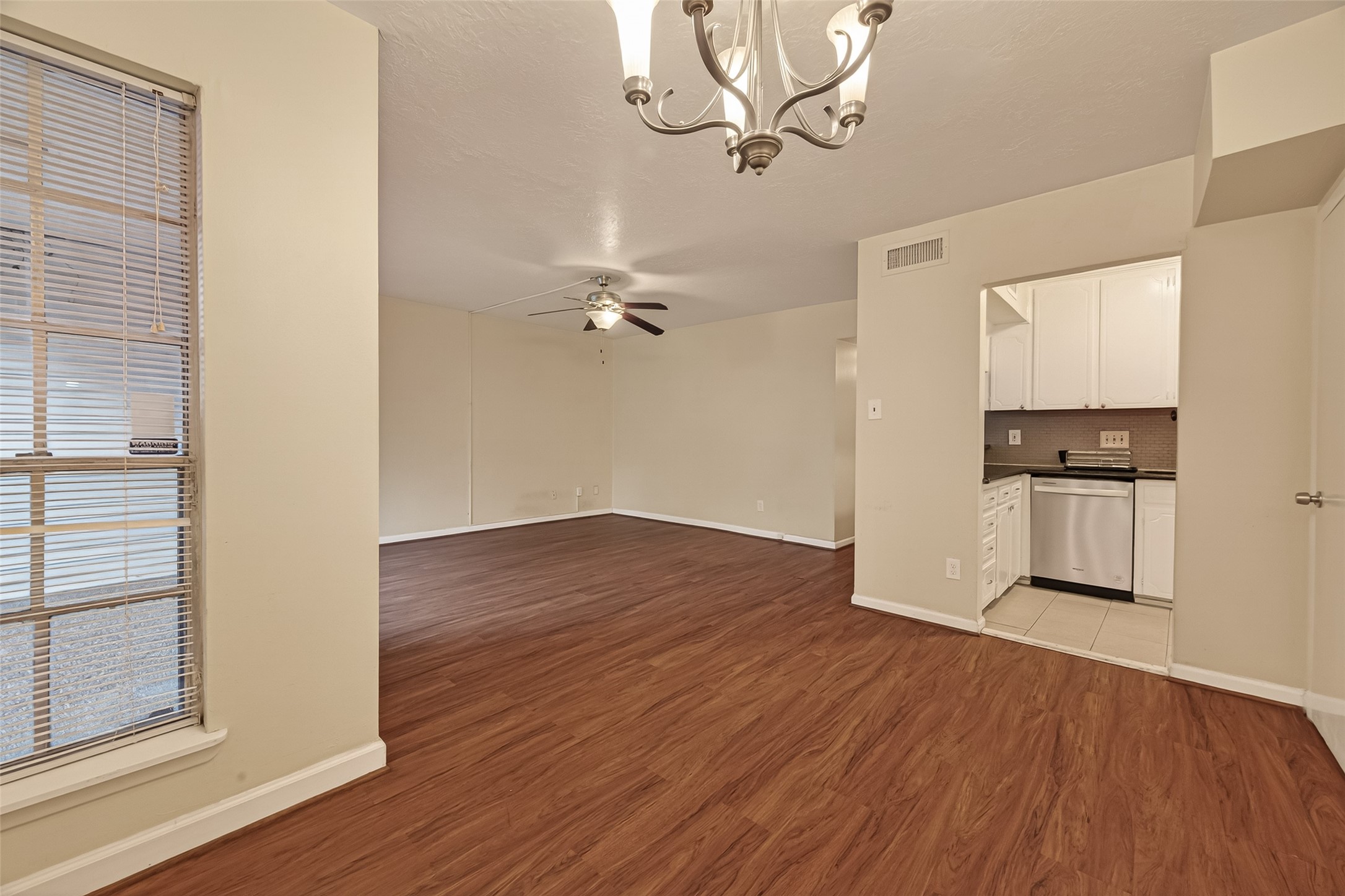 3400 Timmons Lane, Unit 31 Houston, TX 77027 - Photo 13 of 32 a view of empty room with wooden floor