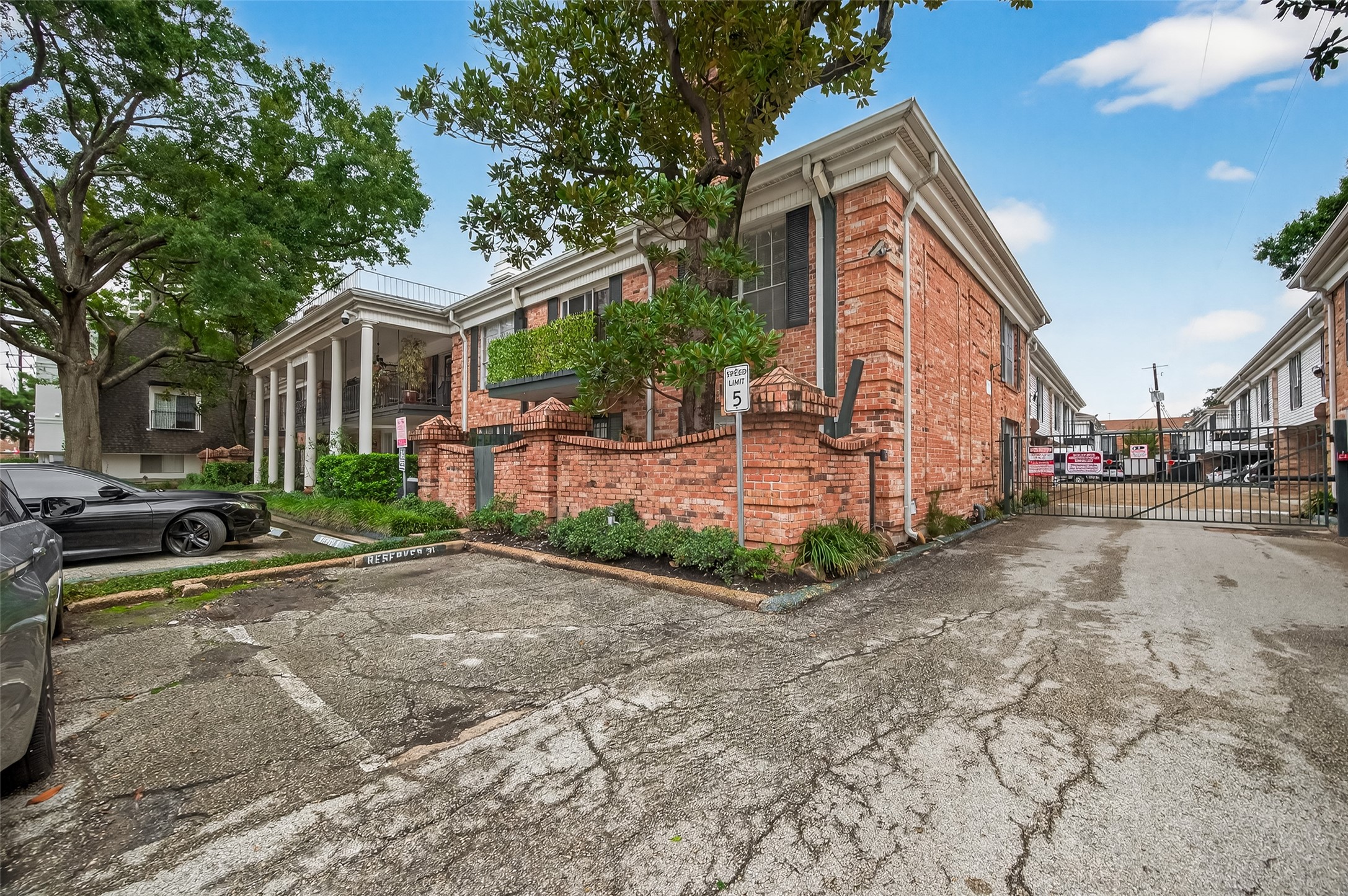 3400 Timmons Lane, Unit 31 Houston, TX 77027 - Photo 32 of 32 a view of a house with a yard and pathway