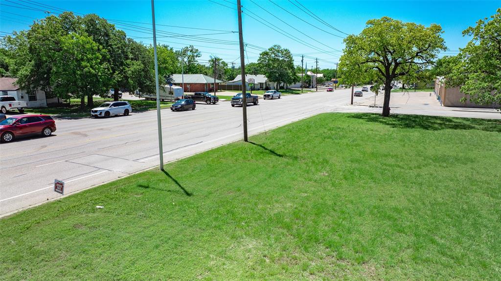 Tbd North Main Street Weatherford, TX 76086 - Photo 17 of 21 a view of a street with a cars park on the side of the road