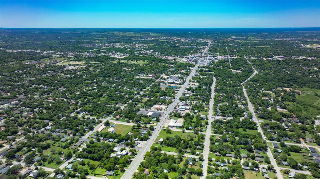 Tbd North Main Street Weatherford, TX 76086 - Photo 5 of 21 an aerial view of residential houses with outdoor space and trees