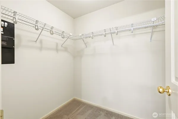 a view of a room with racks on the wall