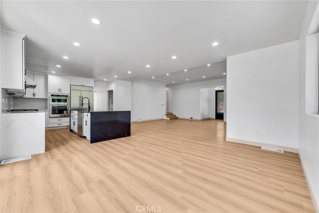 5090 Rockledge Drive Riverside, CA 92506 - Photo 11 of 40 a view of kitchen with kitchen island and stainless steel appliances