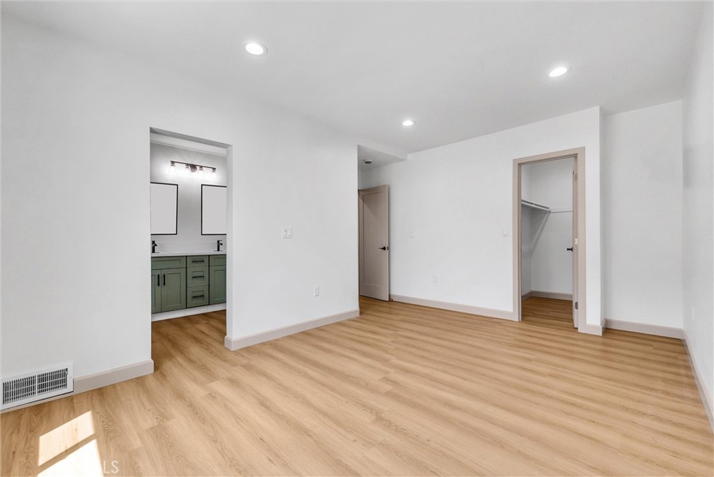 5090 Rockledge Drive Riverside, CA 92506 - Photo 18 of 40 wooden floor in an empty room with a window
