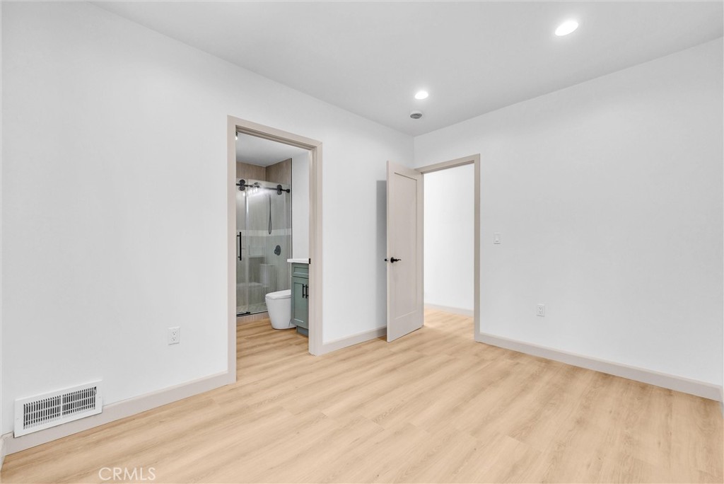 5090 Rockledge Drive Riverside, CA 92506 - Photo 25 of 40 an empty room with a natural light