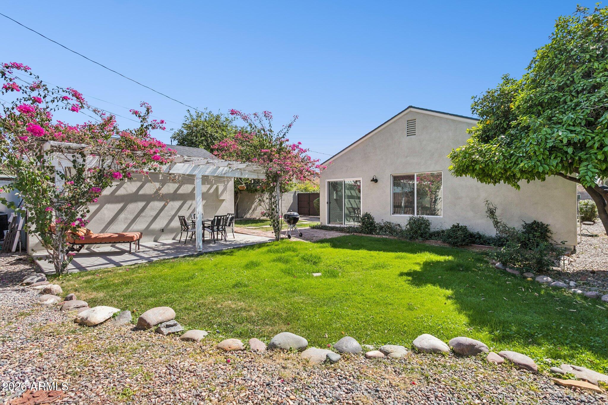 322 West Coronado Road Phoenix, AZ 85003 - Photo 33 of 93 Rear yard features natural grass