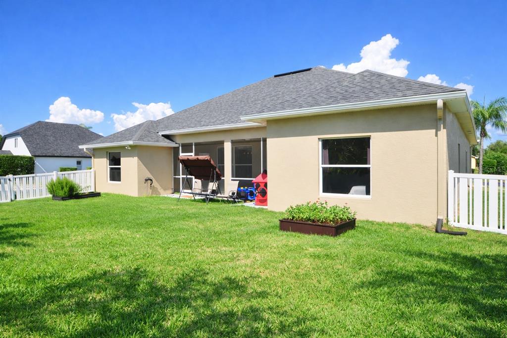2009 Meadow Rue Court Trinity, FL 34655 - Photo 16 of 21 a view of a house with backyard