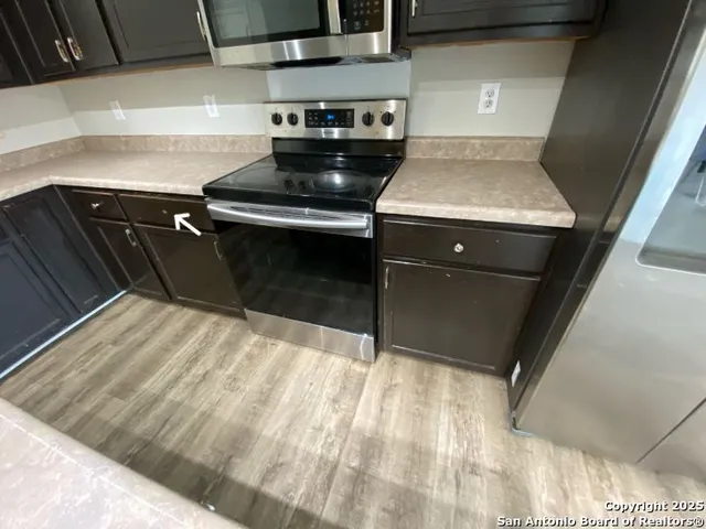 a utility room with washer and dryer