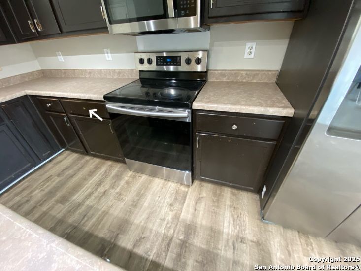 a utility room with washer and dryer