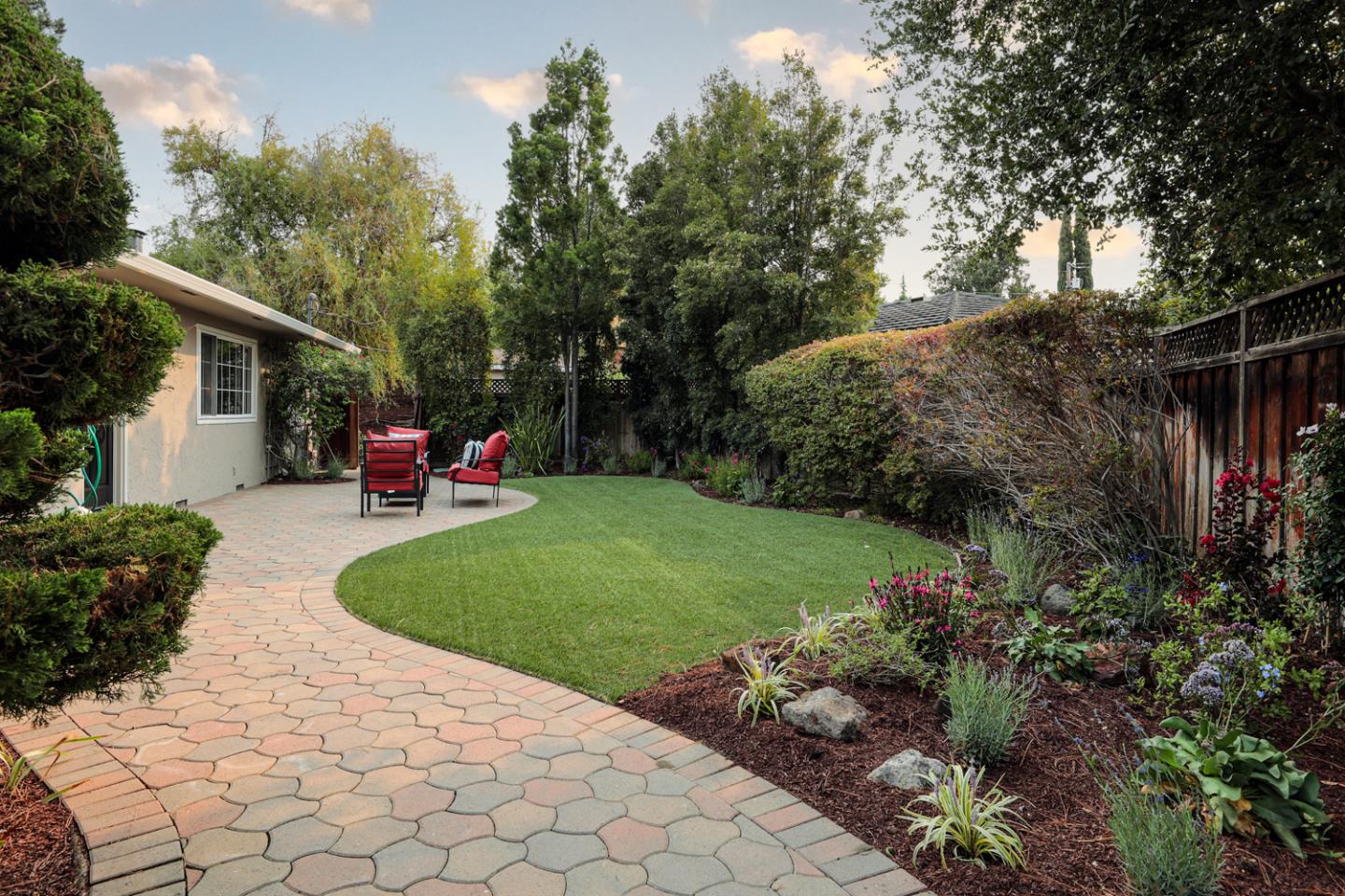 2250 Vía Maderos Los Altos, CA 94024 - Photo 22 of 36 a view of a backyard with plants and a patio