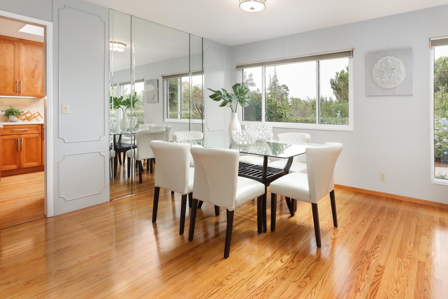 2250 Vía Maderos Los Altos, CA 94024 - Photo 7 of 36 a view of a dining room with furniture and wooden floor