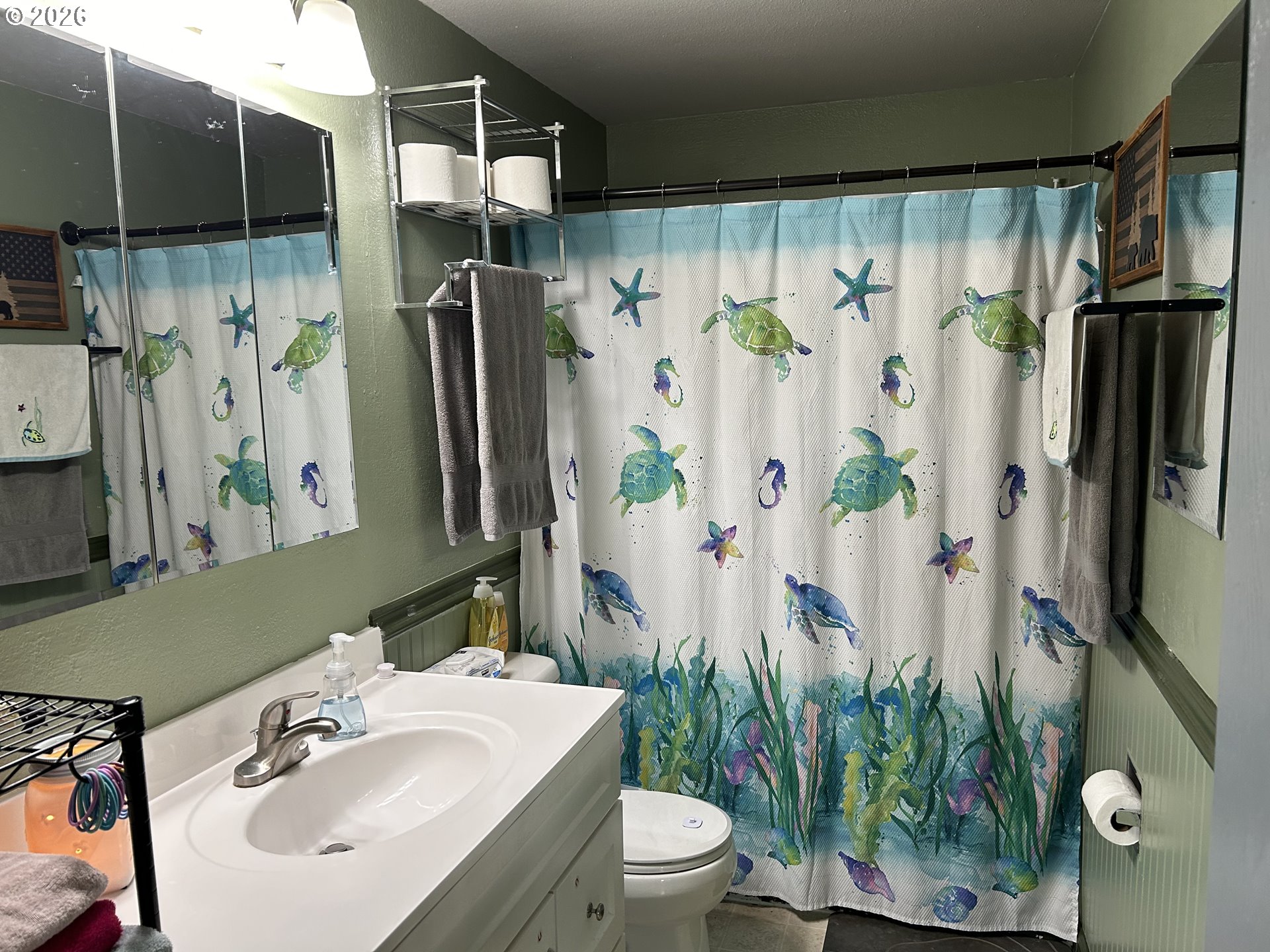 938 North 8th Street Reedsport, OR 97467 - Photo 14 of 16 a bathroom with a sink toilet and shower