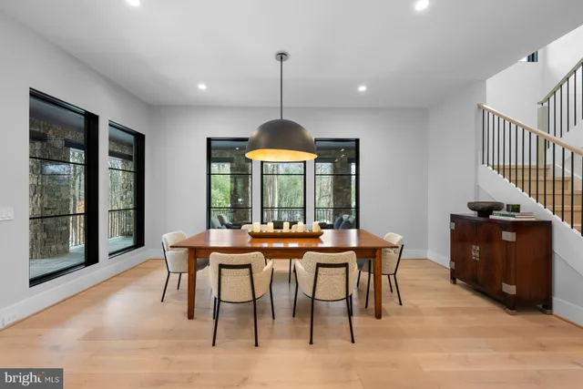 a view of a dining room with furniture window and outside view